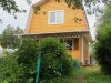 Двухэтажный дачный домик из соснового бруса с верандой