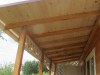 Двухэтажный дачный домик из соснового бруса с верандой